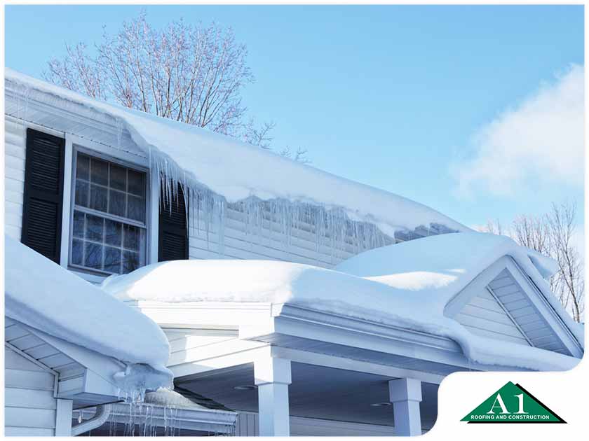 Does Your Insurance Cover Snow Roofing Damage?